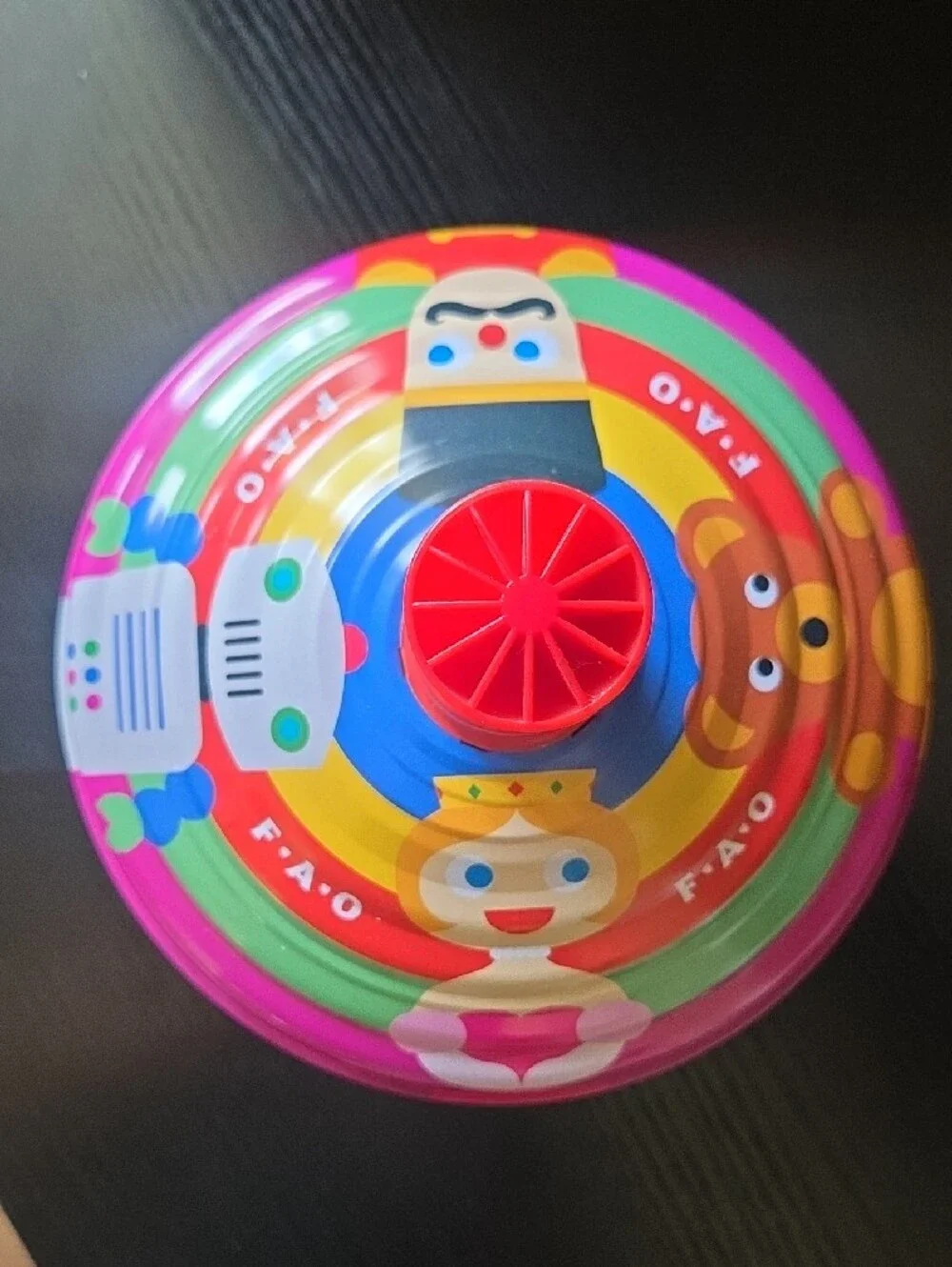 FAO Schwarz Bright Pink Spinning Top with Bear Graphic